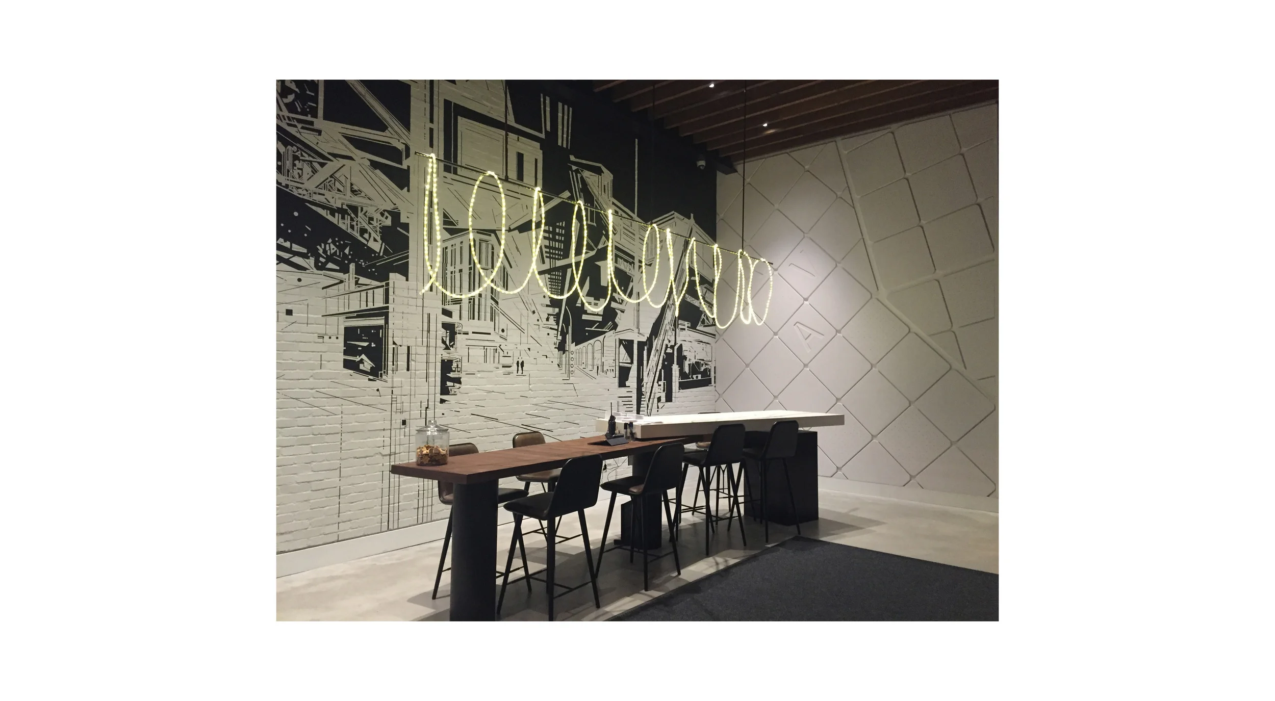 Hand-painted mural by Margaret Inga Urias and 3D router cut map tiles by Grand Image studio.