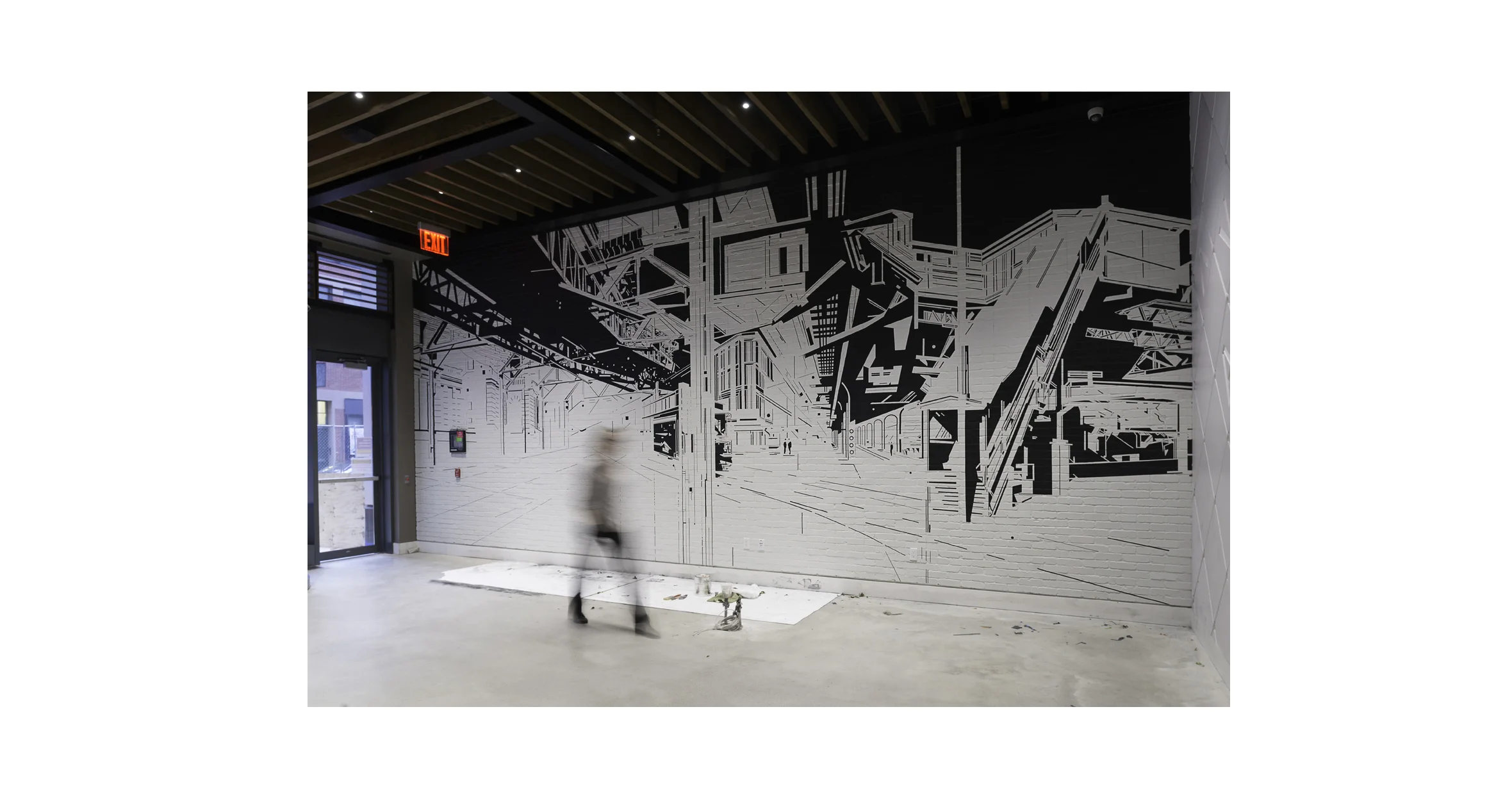 Custom black and white cityscape mural by Brooklyn based artist Margaret Inga Urias. 
