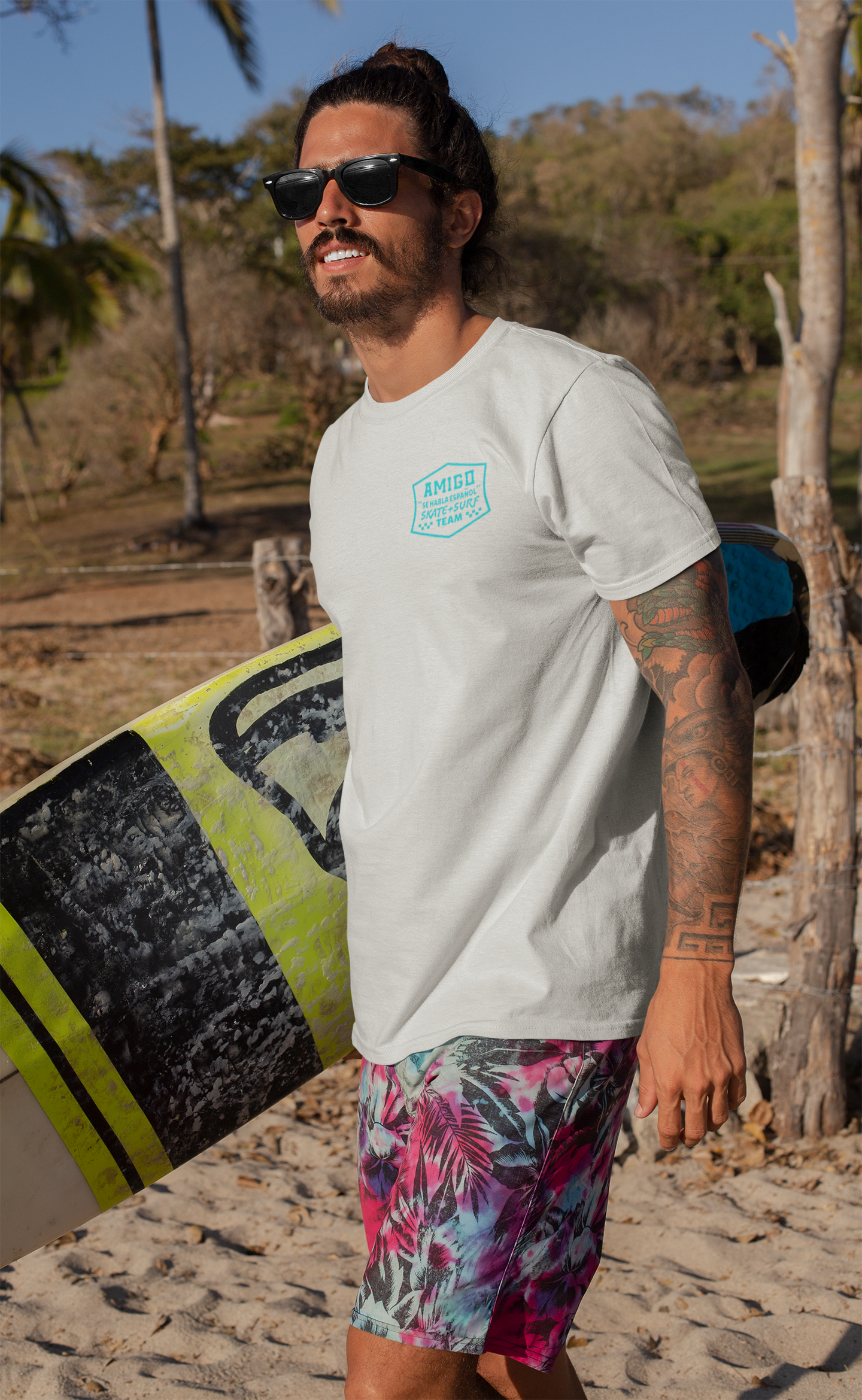 t-shirt-mockup-of-a-tattooed-surfer-man-at-the-beach-26766.PNG