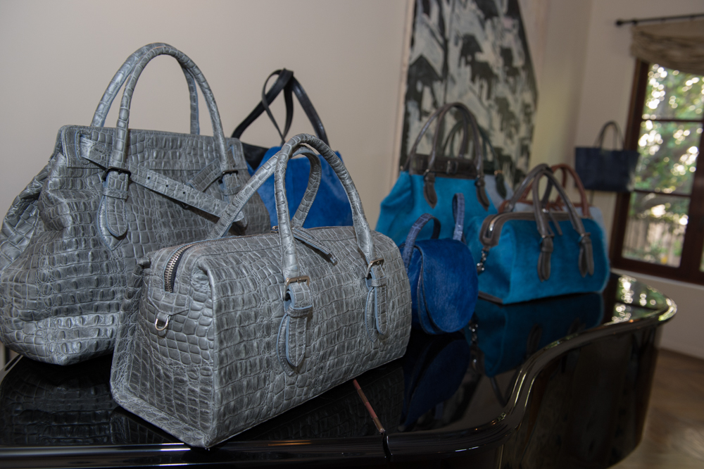 Exotic treatments in Italian leathers: embossed croc, and cobalt and cerulean calf hair.