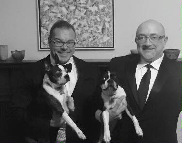 David with his husband and rescue furbabies