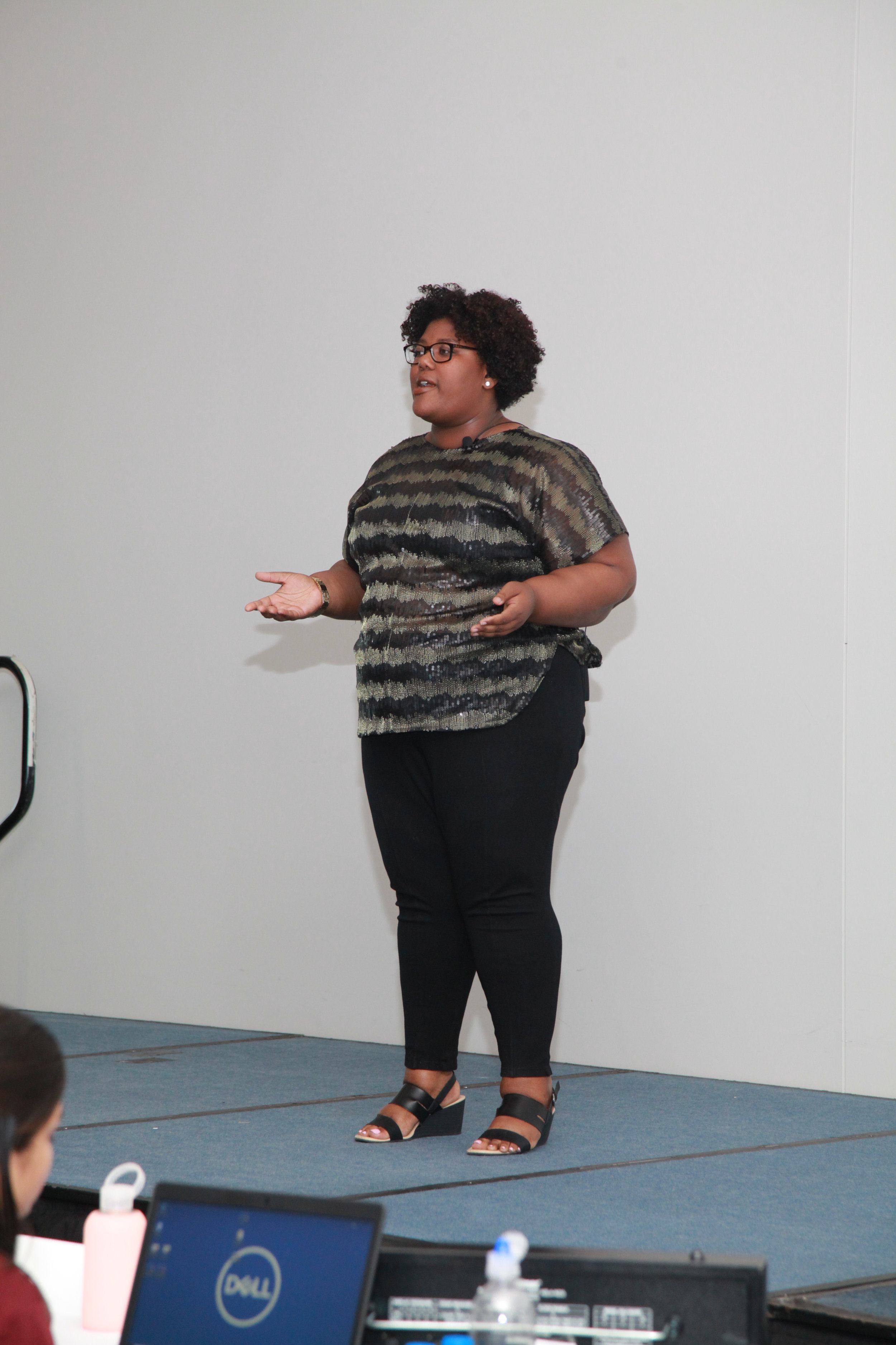 Whitney pitching her business at the WBENC SEP Pitch Competition 