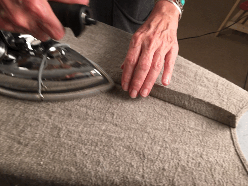 Press back seam toward the front to set for felling. Let seam cool.