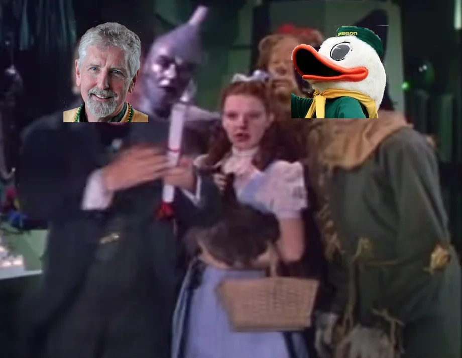 Scott Coltrane in his alter ego role as the Wizard of UOz, handing out diplomas and grades instead of brains and educations.