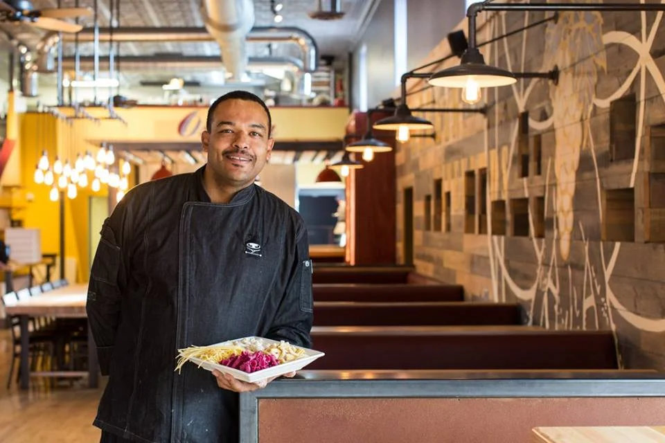 Chef Christopher Smith creating food, delighting the tastebuds