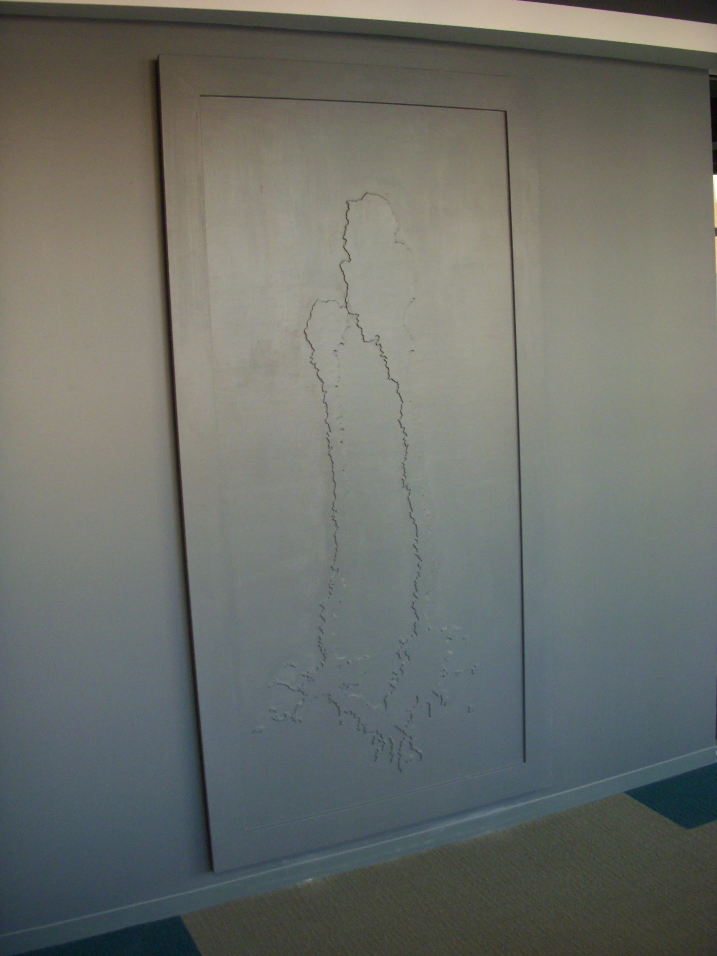 Michael X. Ryan Roadstains; block party beer stain on Potomac Ave., Chicago, July 2004 , 2007 Wood relief (Finnish and Baltic plywood) and latex wall paint to match wall 7' x 3' 6” x 2”