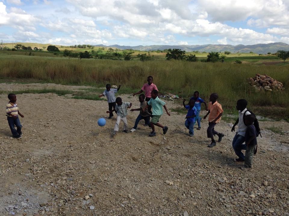 The kids are having fun playing with their new futbols!