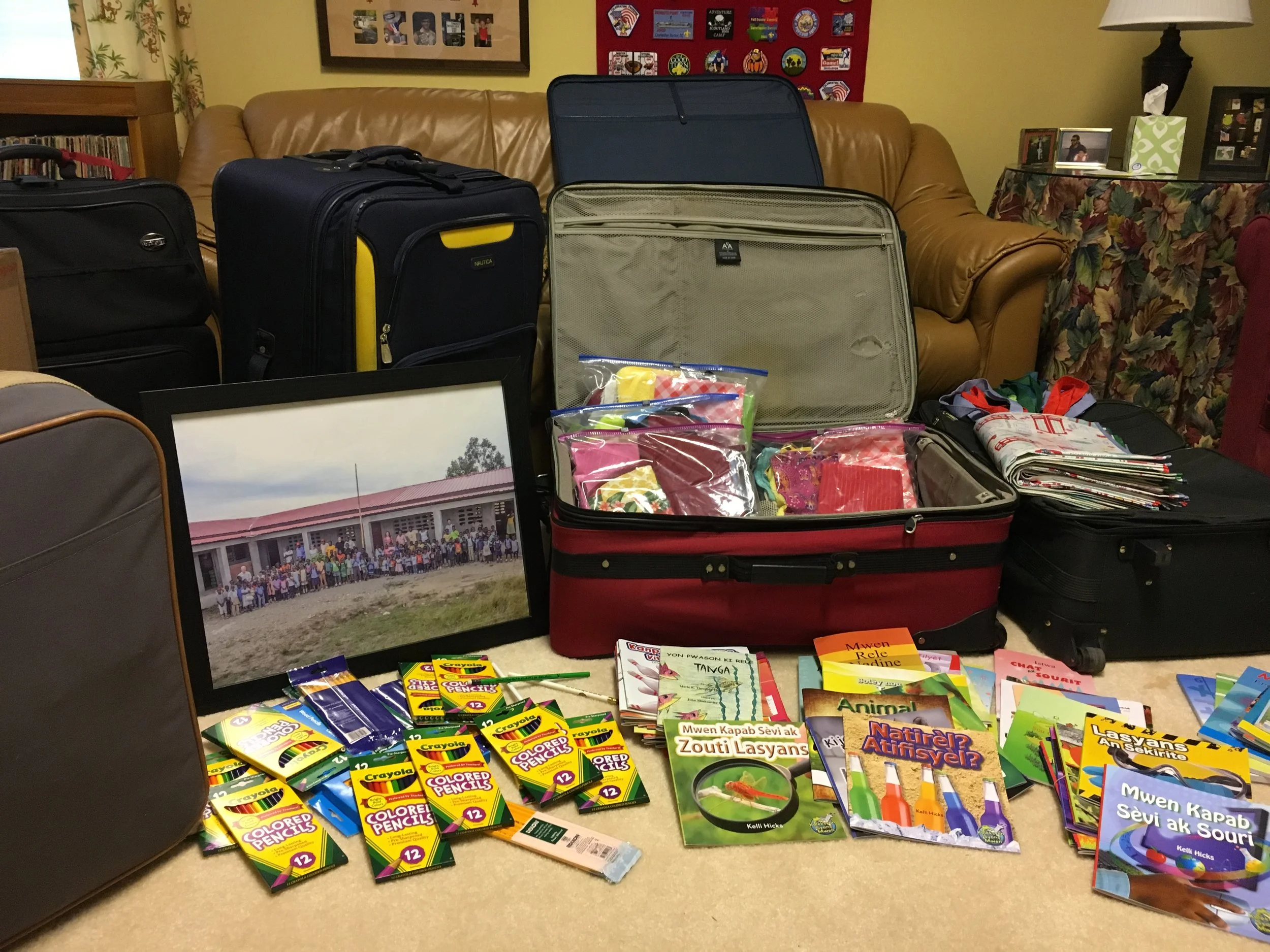 Suitcases packed with love and gifts