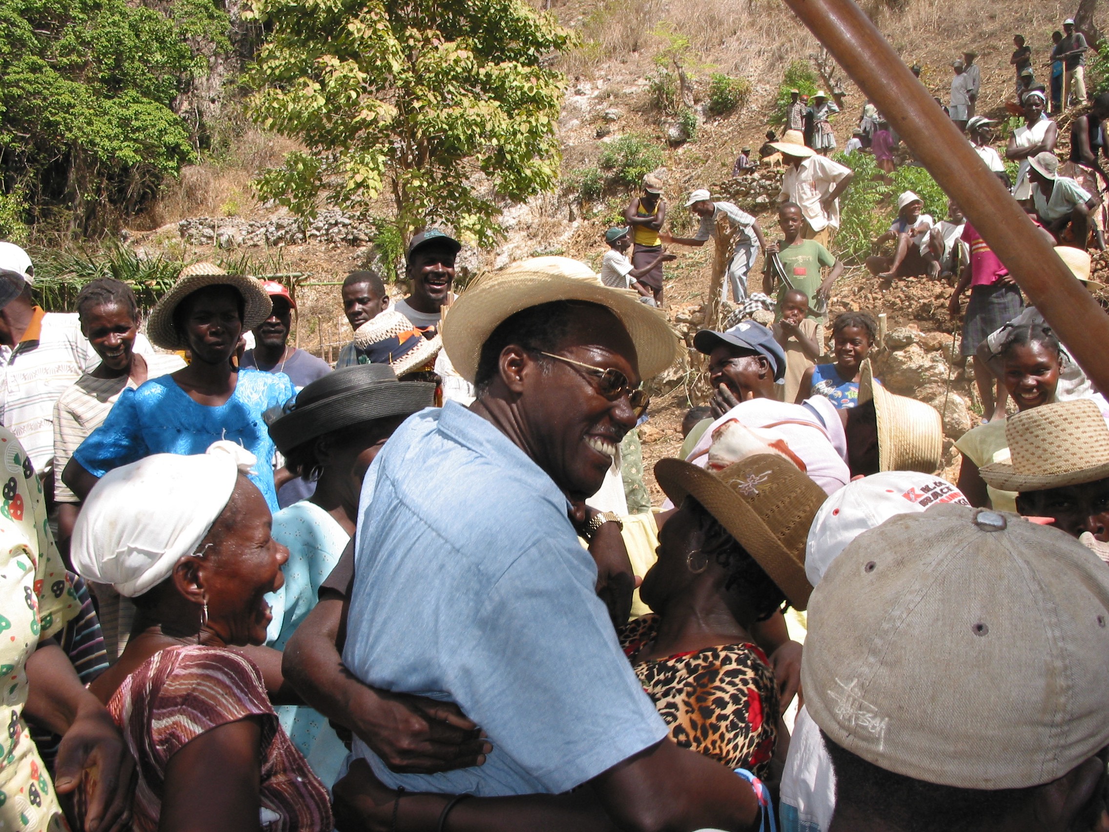 Chavannes Jean-Baptiste, 2005 Goldman Environmental Prize Winner, Islands & Island Nations (Haiti), at a traditional konbit--a communal work day spent building walls to conserve the soil.