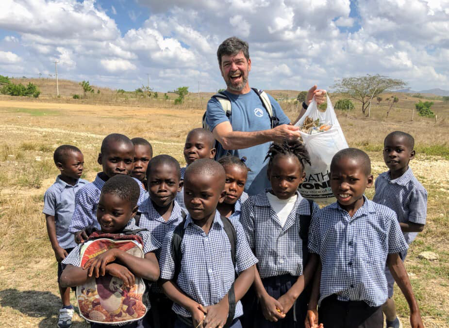 Pat with kids in field.jpg