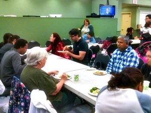 A shared meal at the end of a 10 week session. People and food from all over the world!