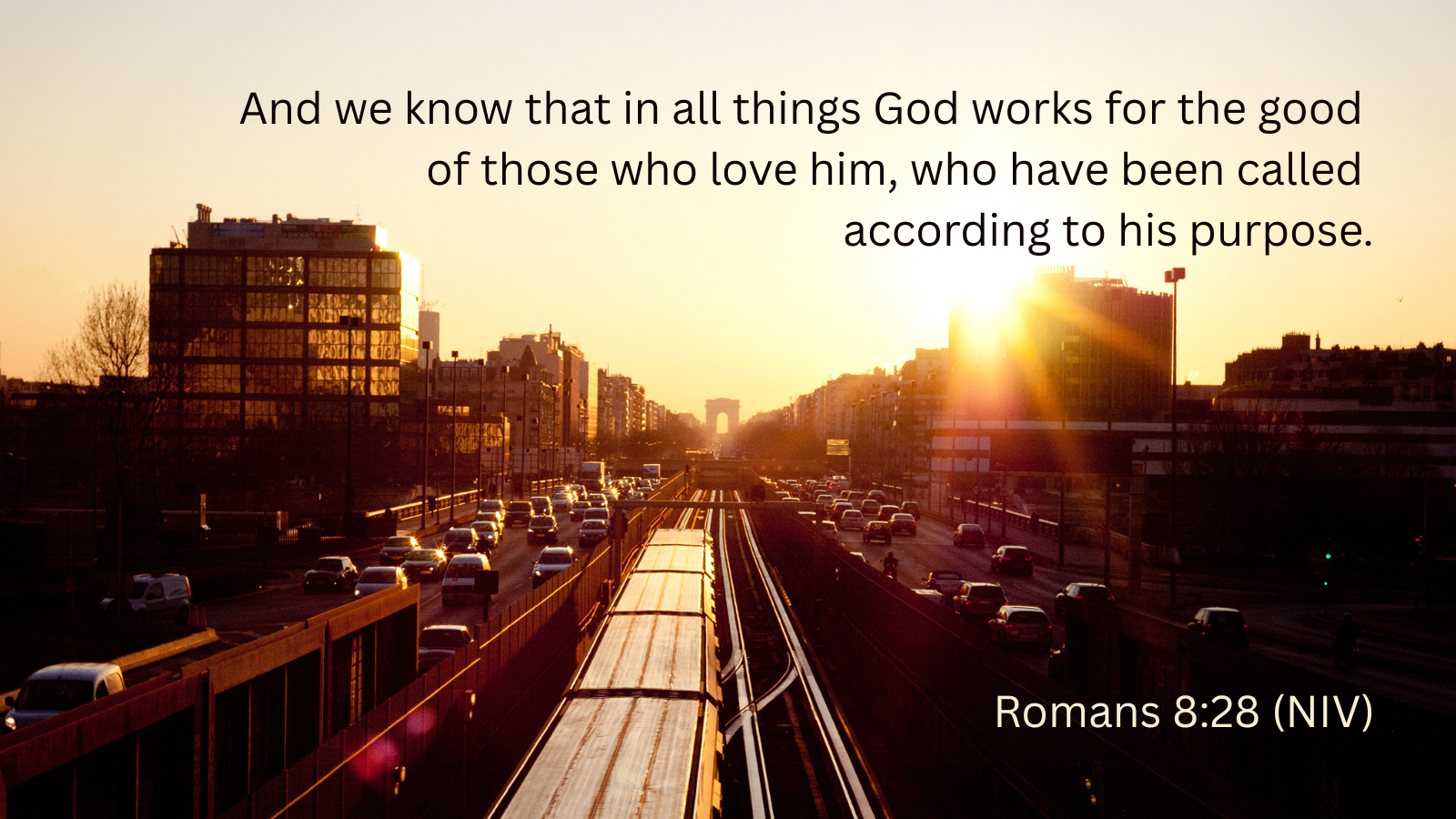 commuter traffic at sunset with quotation of Romans 8:28, NIV