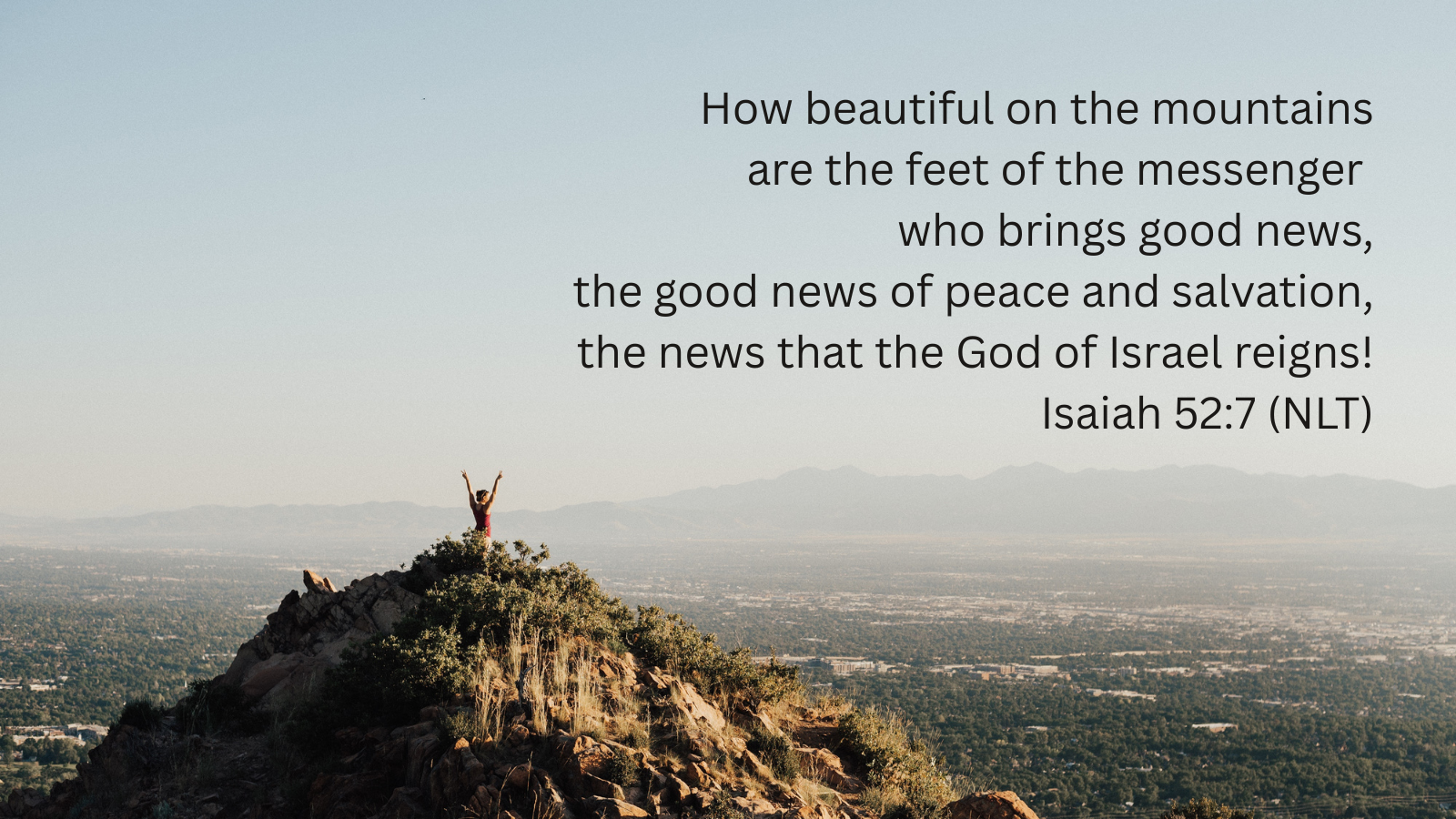 a woman with upraised hands standing on a mountain top overlooking a valley and a quotation of Isaiah 52:7, NLT