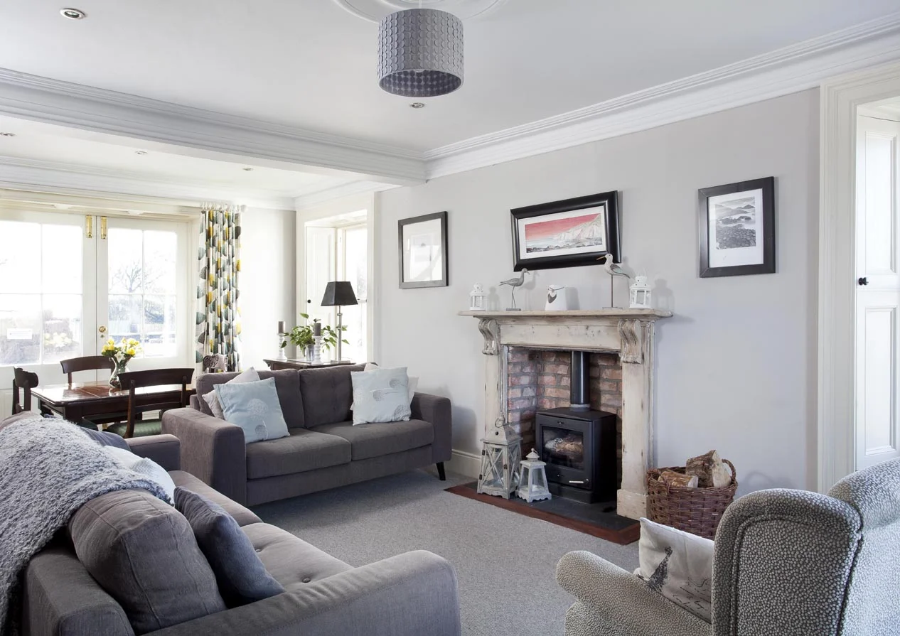 Cosy sitting room where traditional and modern styles mix effortlessly.