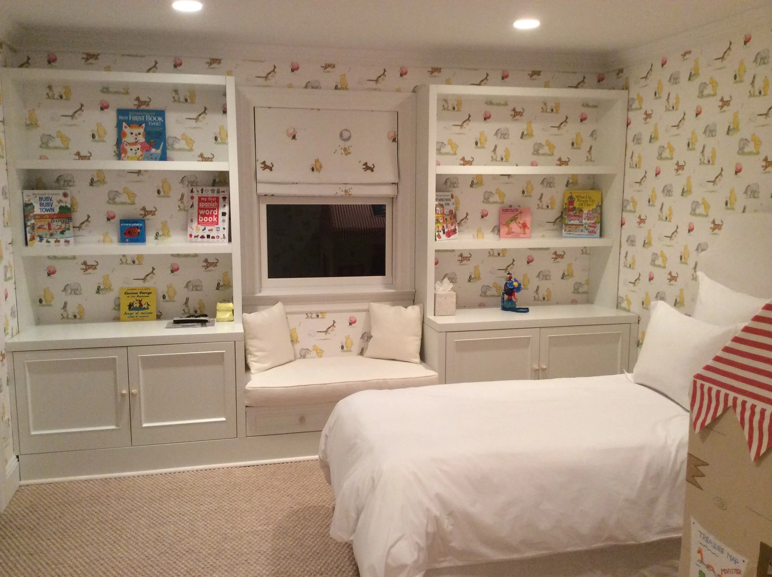 Wallpaper installation in nursery room