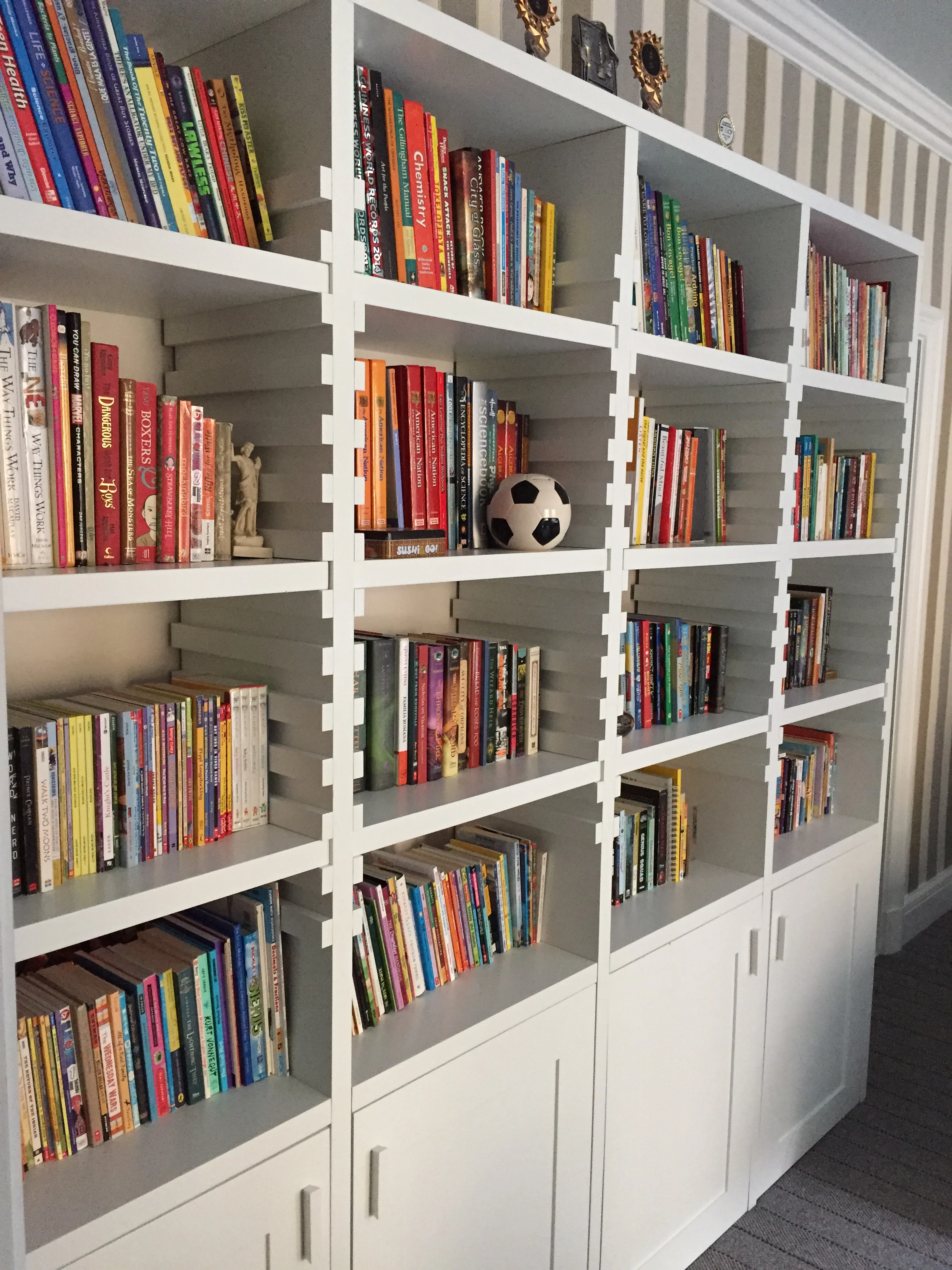 custom shelving and storage unit for kids' room