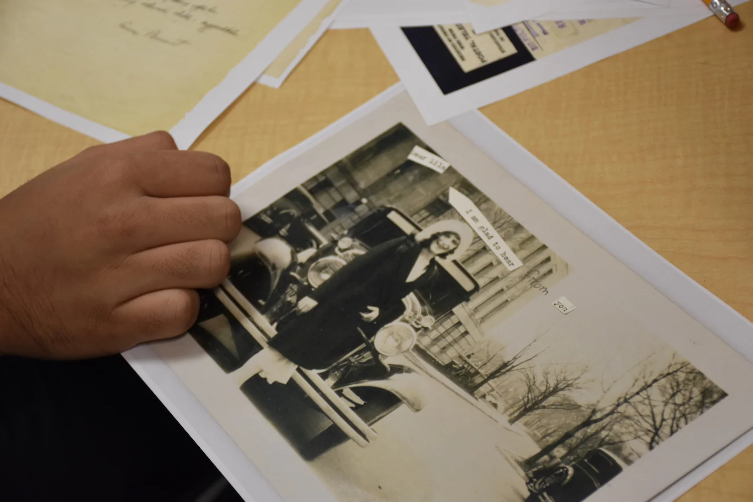 Student making a zine page
