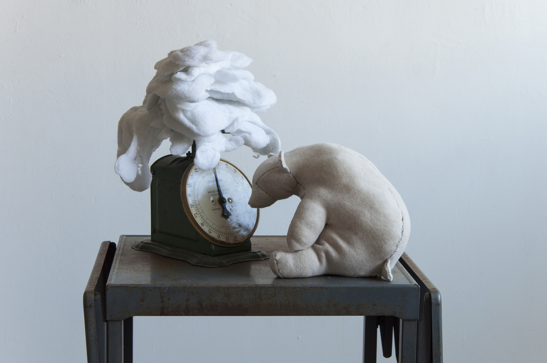 Susan White Bear and Scale 2016 44 x 21 x 15 inches Scale, stuffing, fabric, thread, cart