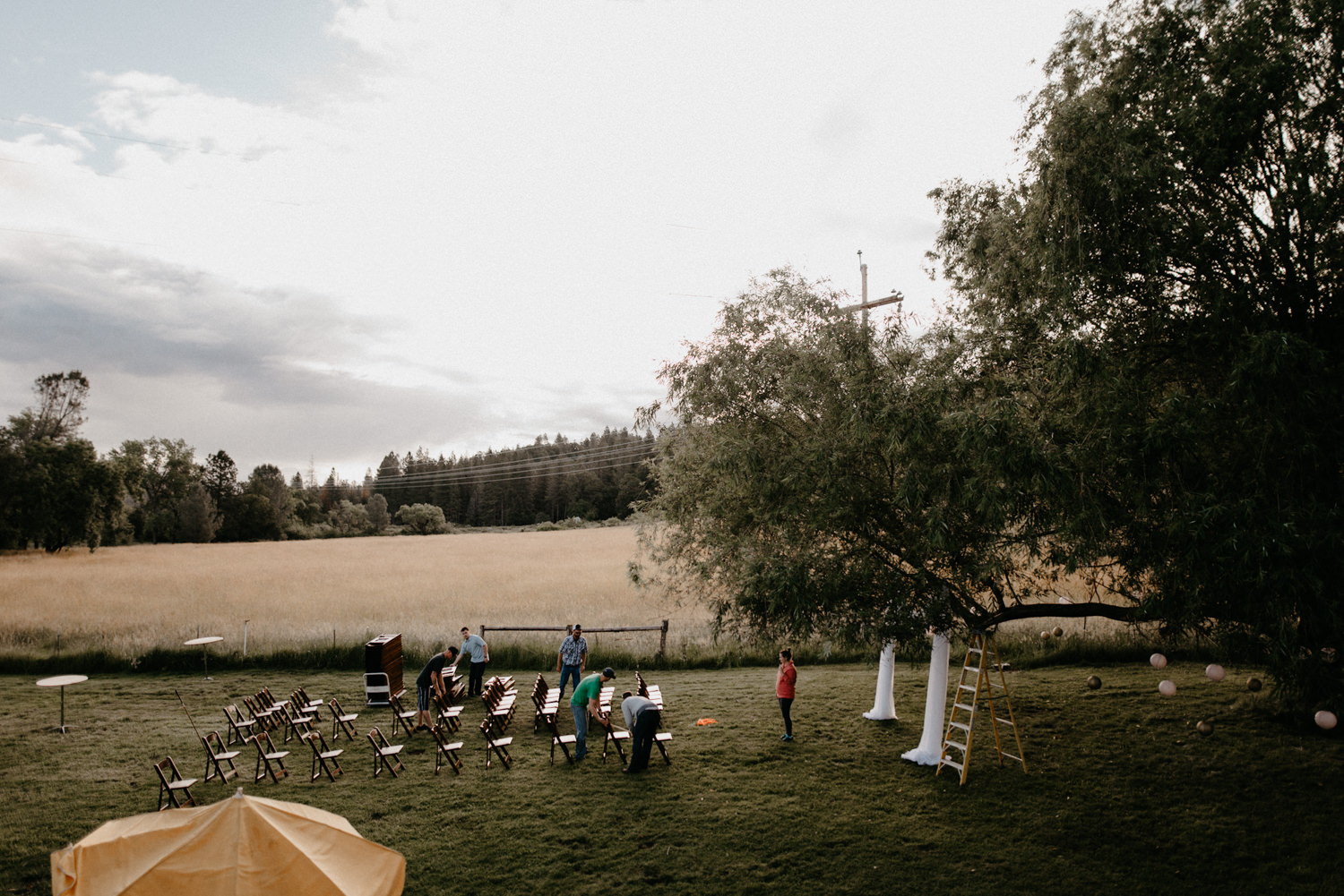 groomsmen setting up chairs