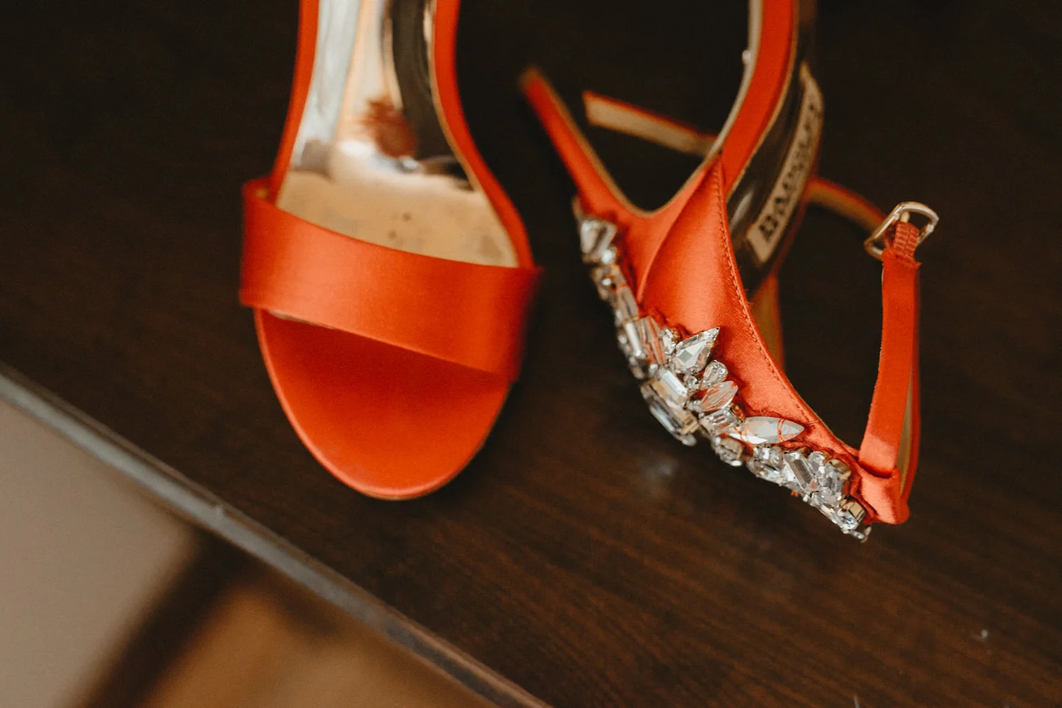 jewels on red pair of badgley mischka high heel shoes