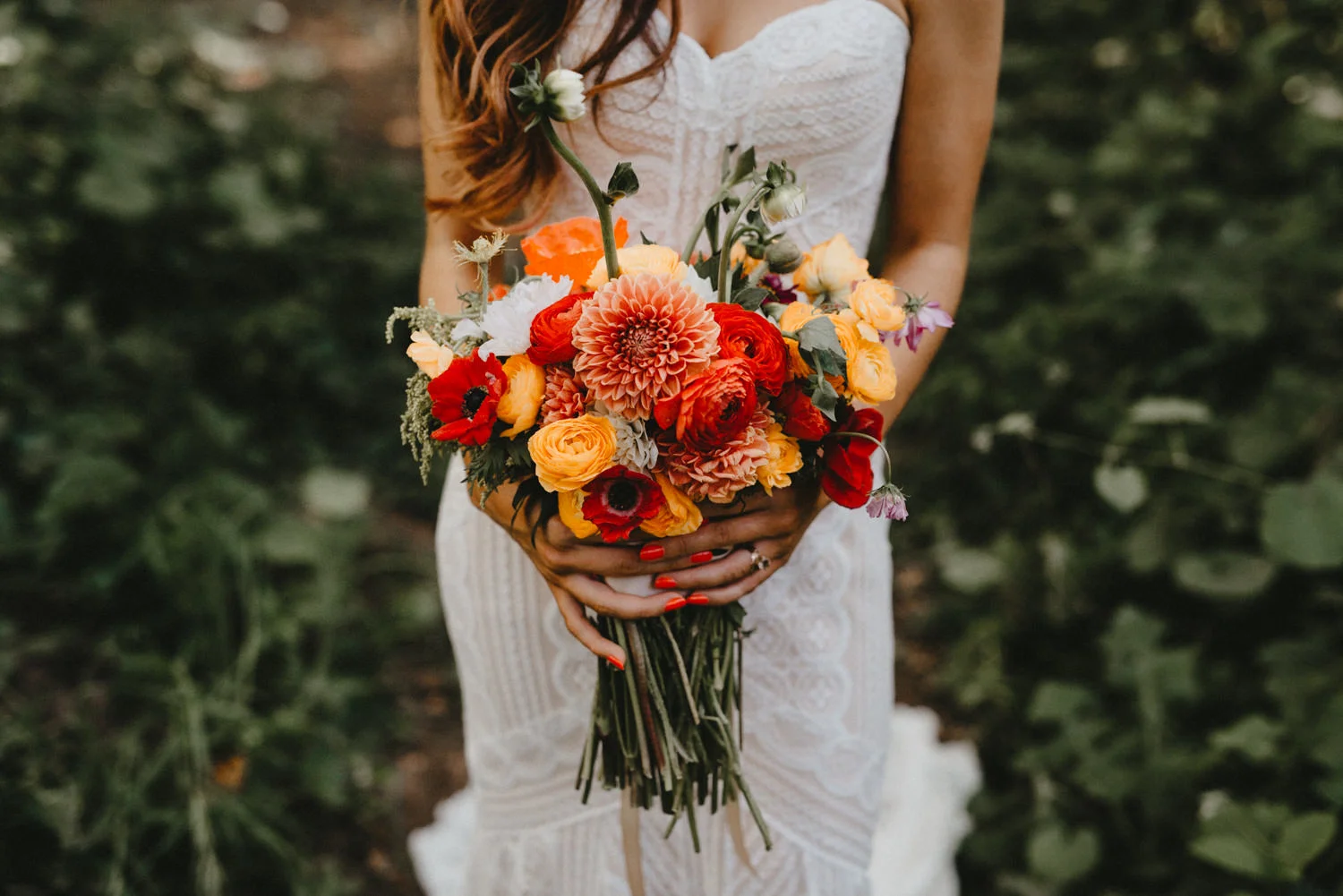 bride holds her diy bouquet