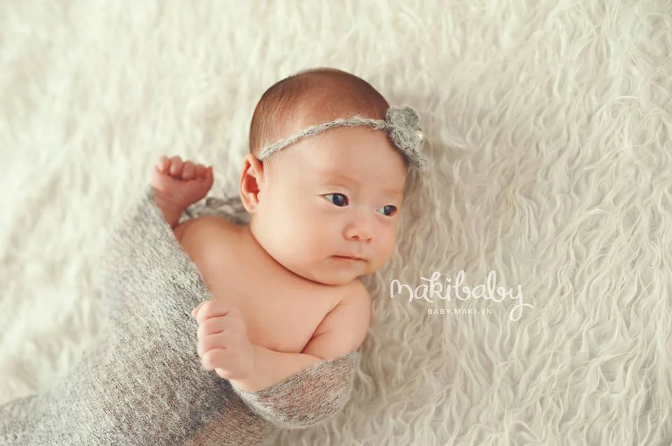 Chụp ảnh cho trẻ sơ sinh. Ảnh: MAKI Baby
