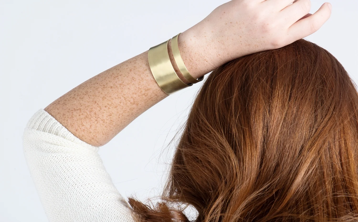 Art Deco-style red brass cuff bracelet and earrings