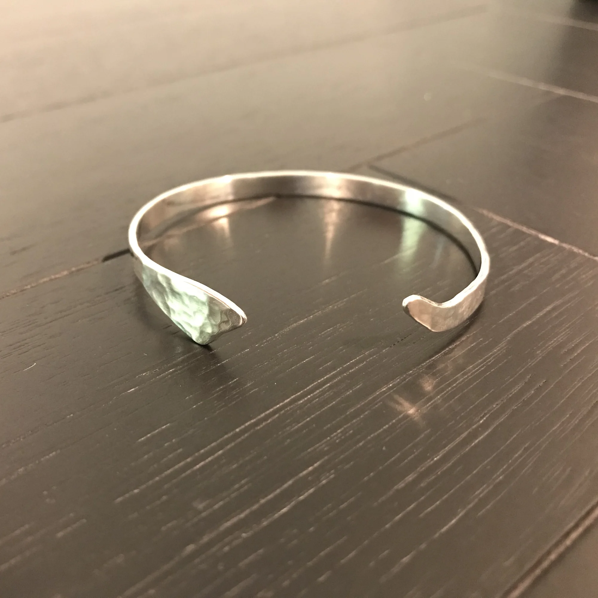 Asymmetrical cuff