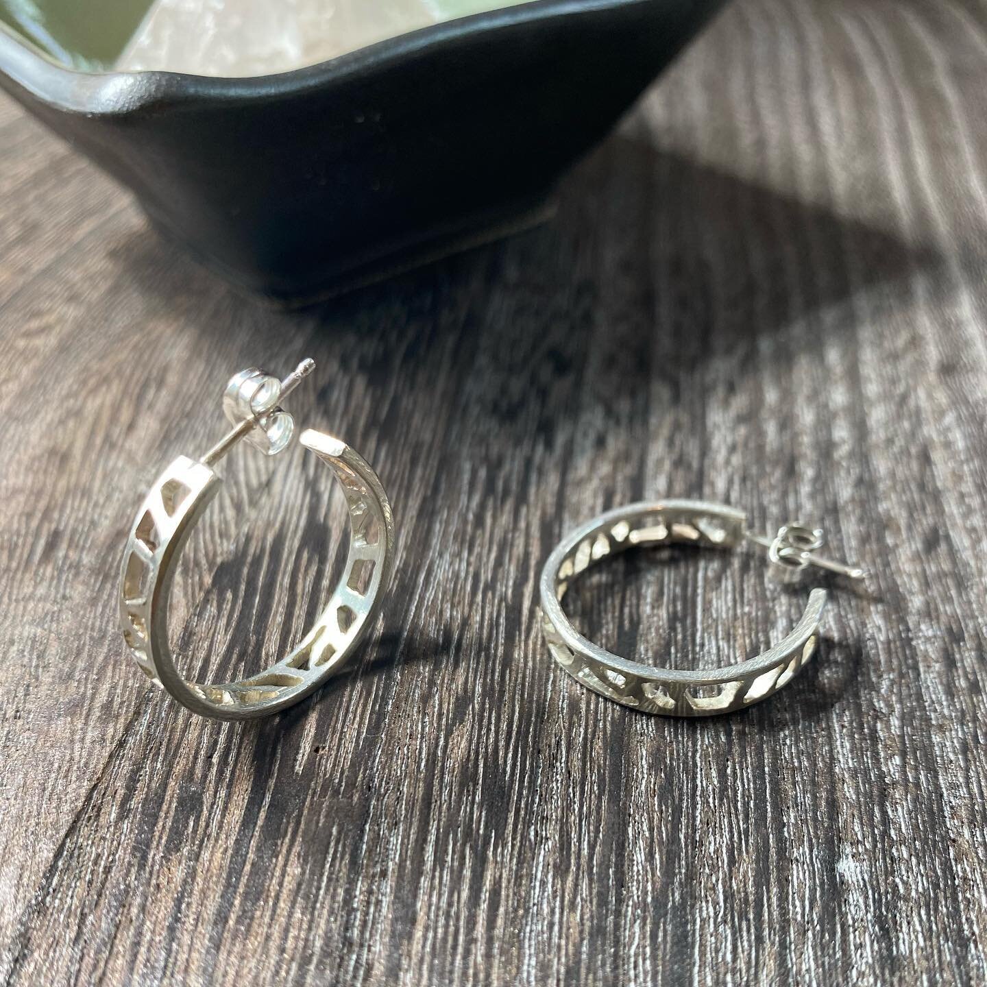 Fresh off the bench. Perfectly imperfect hand sawn hoops were a meditative experience to make.  #silversmith #hoopearrings #madeinmassachusetts #studiojewelry