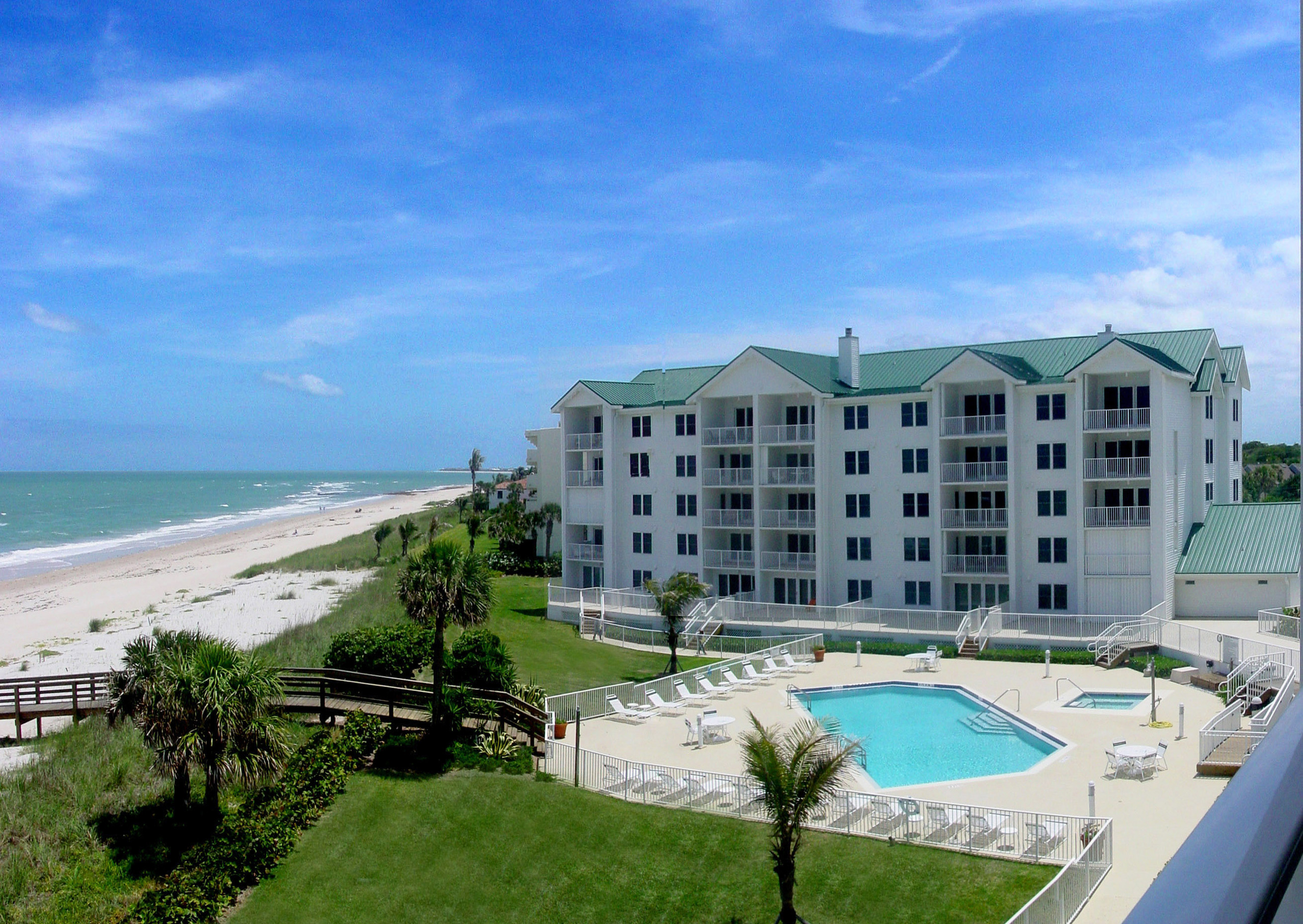 Aerial of the Gables oceanfront condo and pool