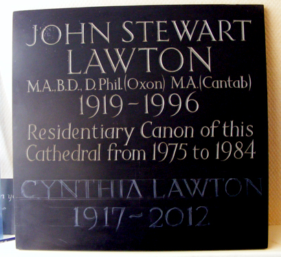 Part of a letter cutters work is to carve additional inscriptions. Copying the original style of lettering. this shows the letters marked on the slate before cutting. 