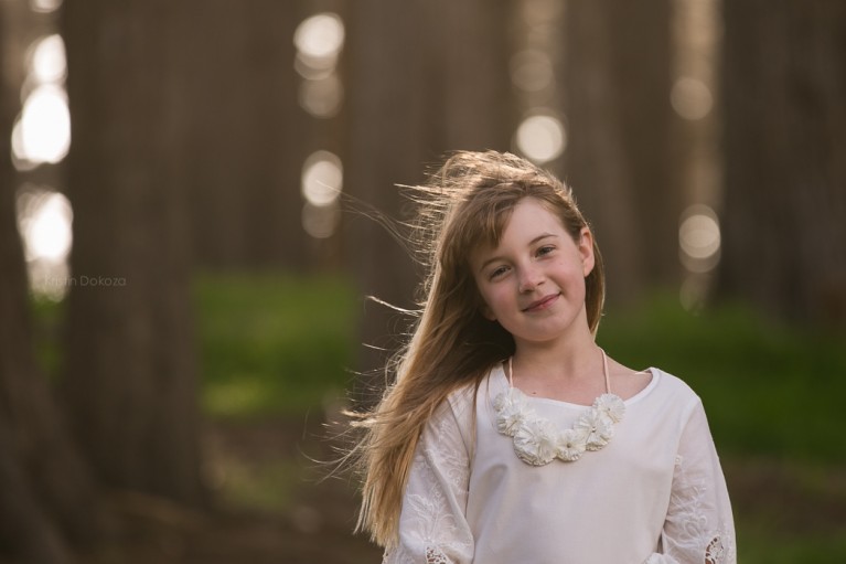 picture-of-girl-smiling-near-trees-by-Kristin-Dokoza-767x511.jpg