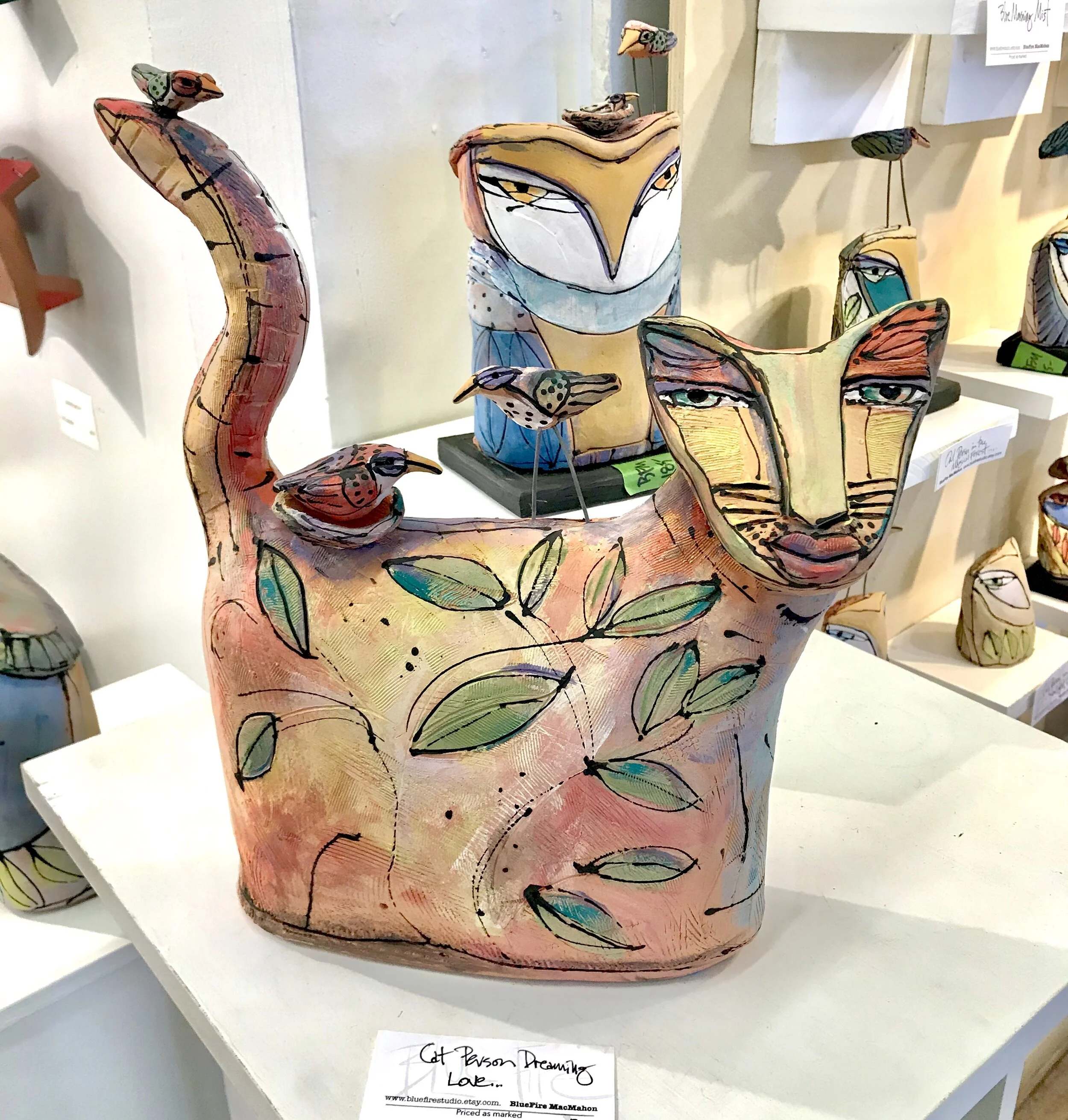 Cat and 3 Birds in the Bush