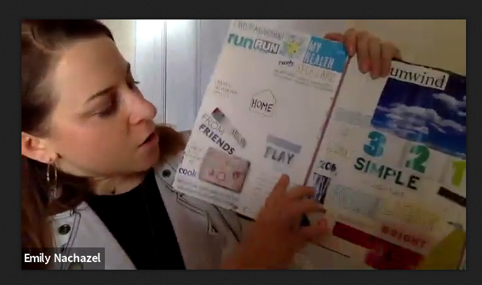 Me showing off one of my past vision boards during the workshop!