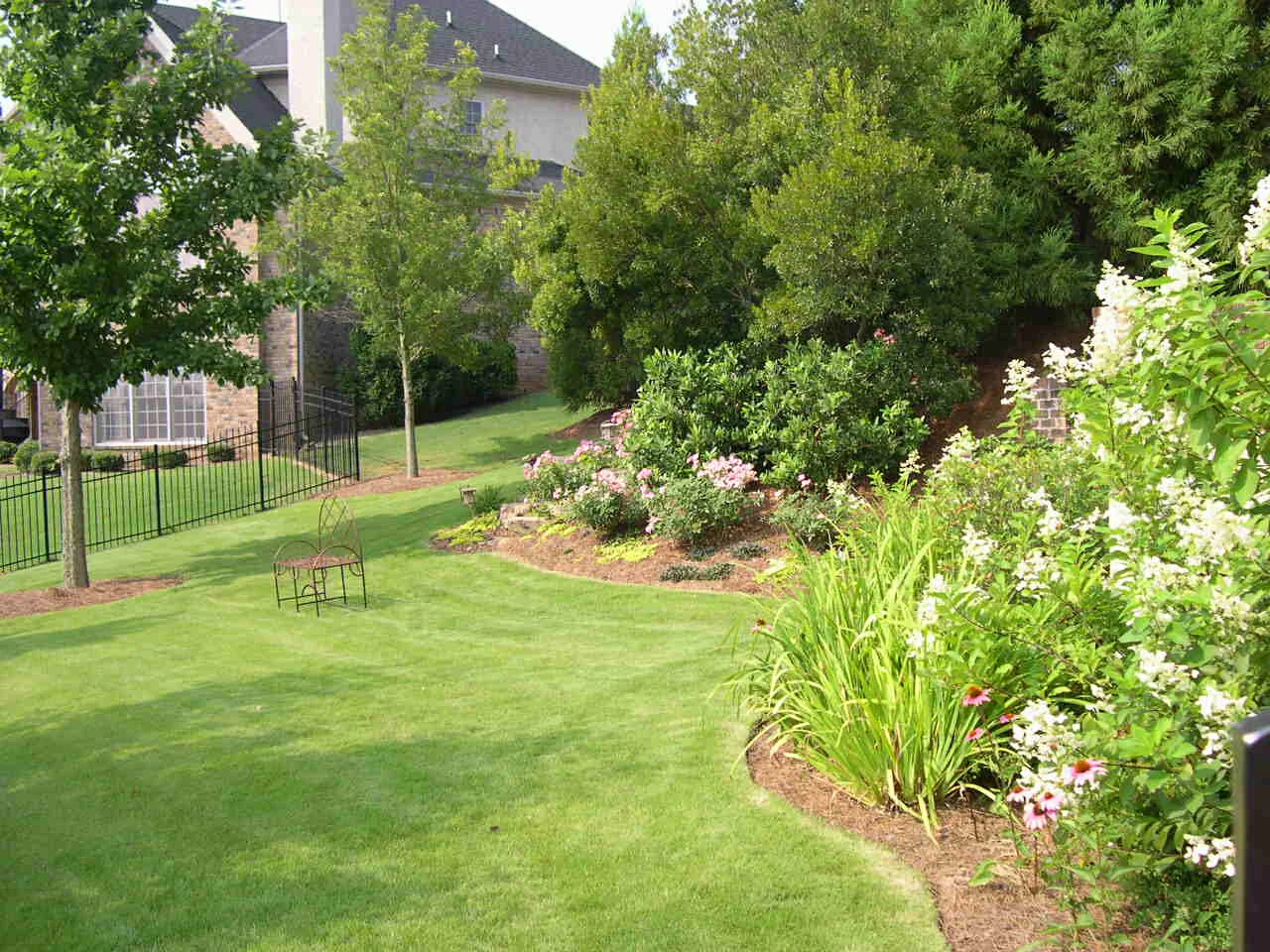 Mcclanahan bench in lawn.JPG