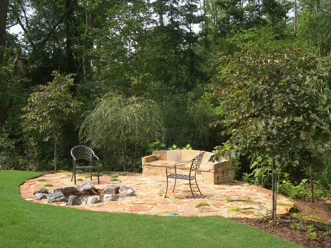 Natural patio with fire pit.JPG