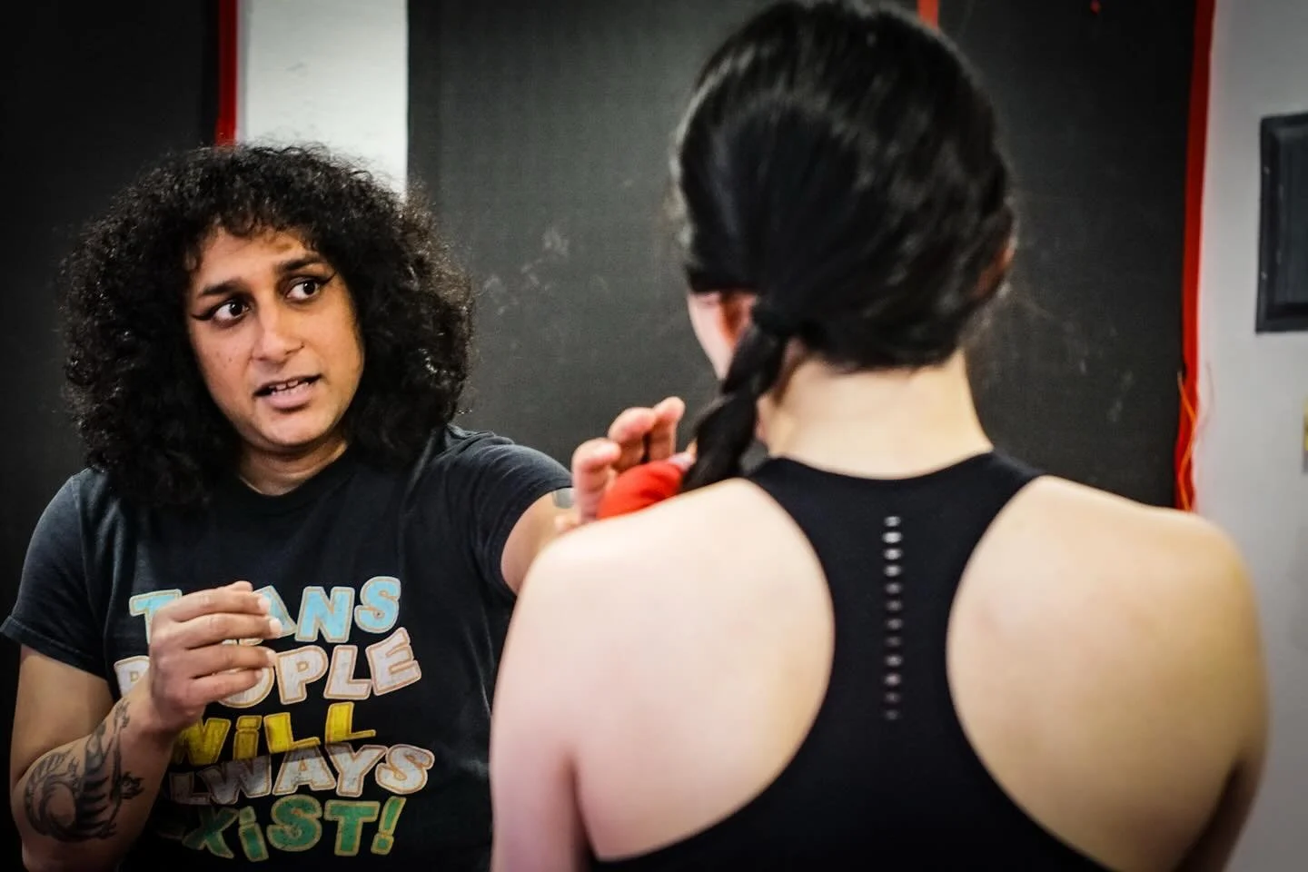 Simi (@simi_thescarletfury ). leads a mixed martial arts class on the official opening of MMA - Muse Martial Arts (@realhausofmuse ). Here, Simi and Kaitlyn practice sparring, punches, and kicks. They work out strategy, technique, and timing. 

April
