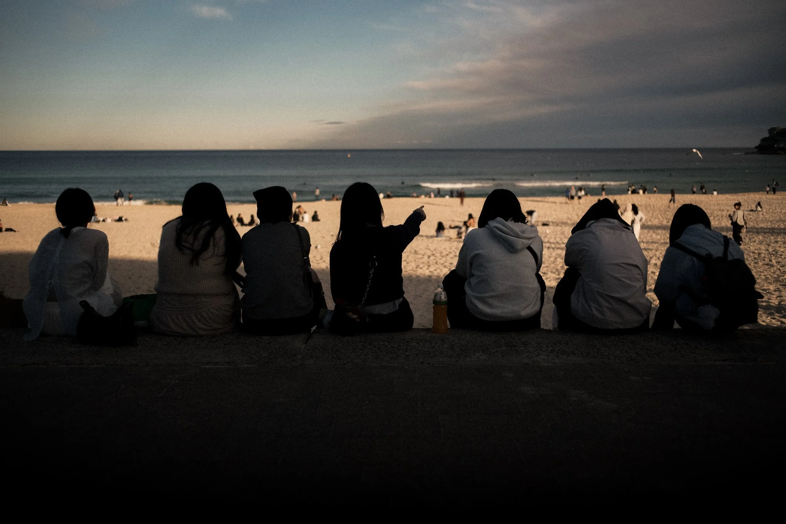 Sydney Harbour and Bondi Beach. 

It&rsquo;s winter, and there&rsquo;s a &ldquo;Christmas in July&rdquo; festival happening, so you have a mix of folks in fur coats and sweaters ice skating in a lovely little set up near beach, alongside surfers and 