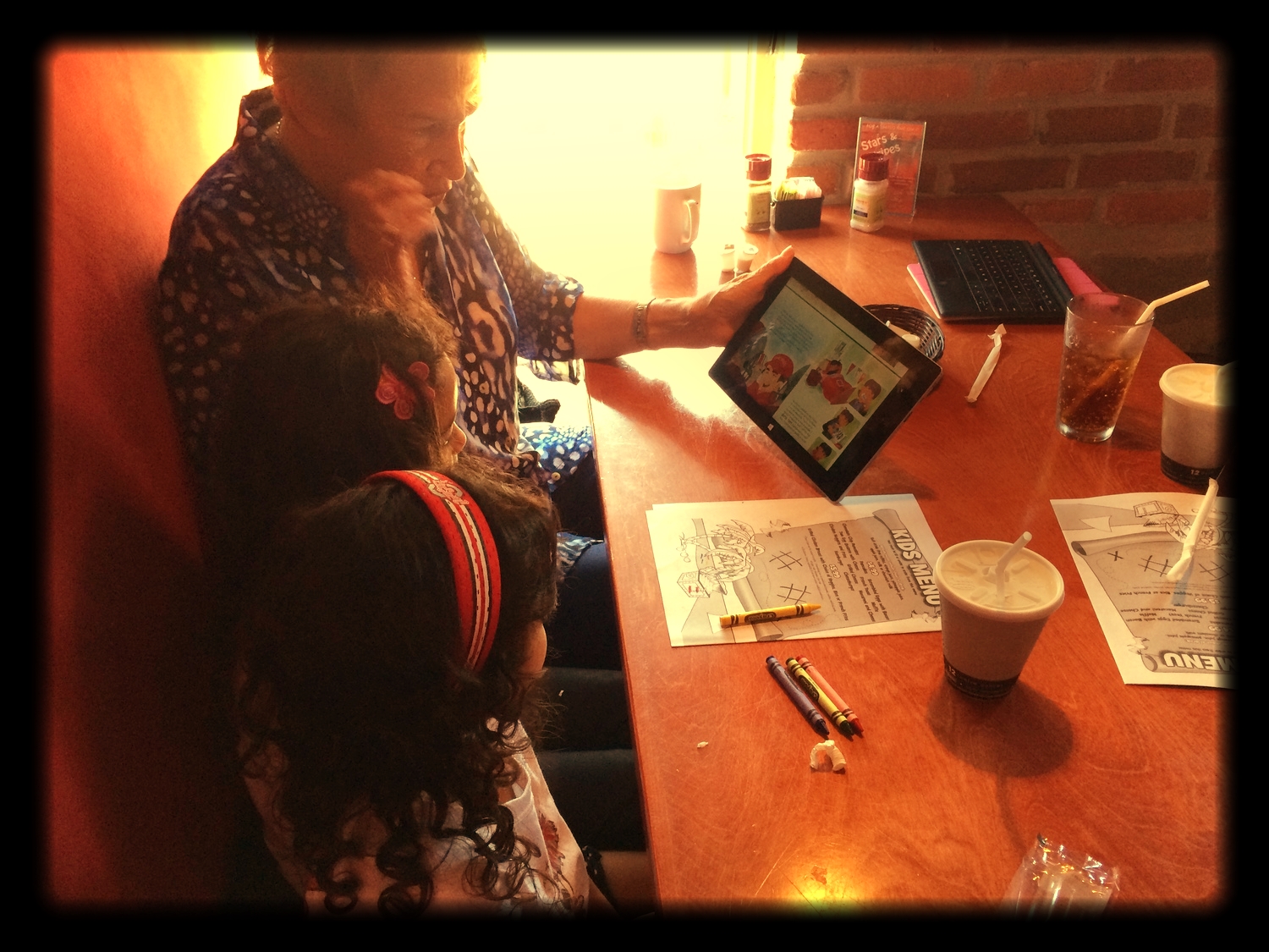 Ms. Jane Fawcett-Hoover reads "The Day I Met Woody" with my little girls. 