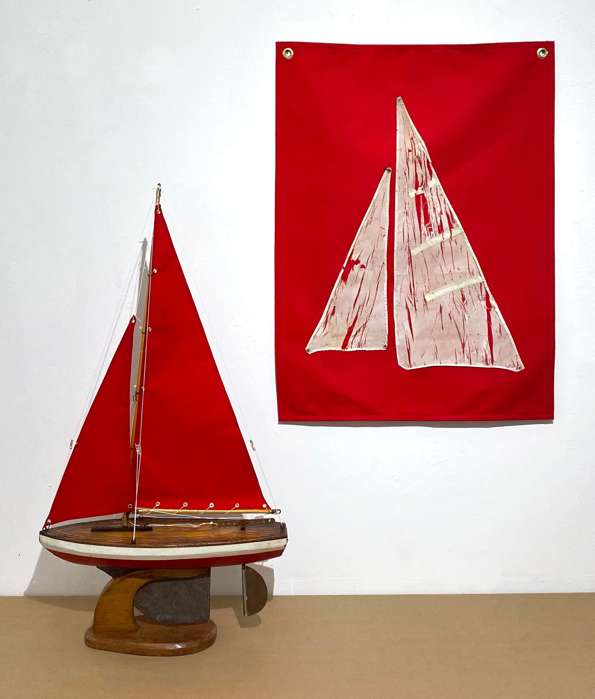 When My Dad Was a Kid He Never Had to Worry About Sea Level Rise, Wooden model boat made in 1967 by my grandparents for my father - replaced sails in 2022, red fabric, white string, and grommets 