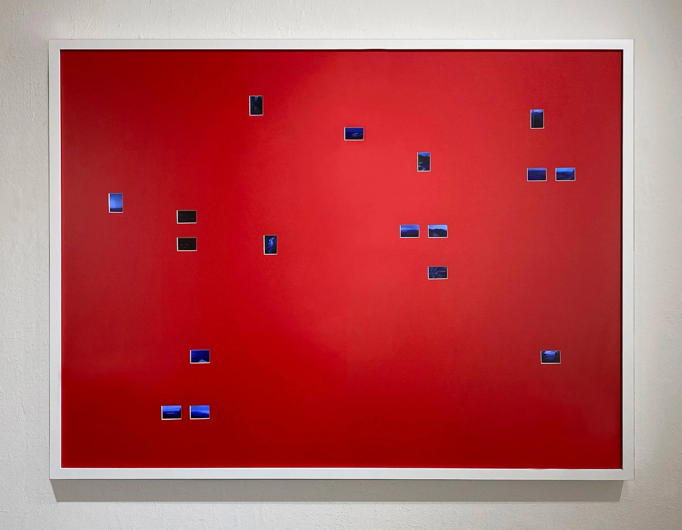 Remaining Wilderness, 2023, Lightbox - Color slides of landscapes taken by my father James Gustavson in 1981 & 1982, LED lights, and red mat, 40" x 30” 