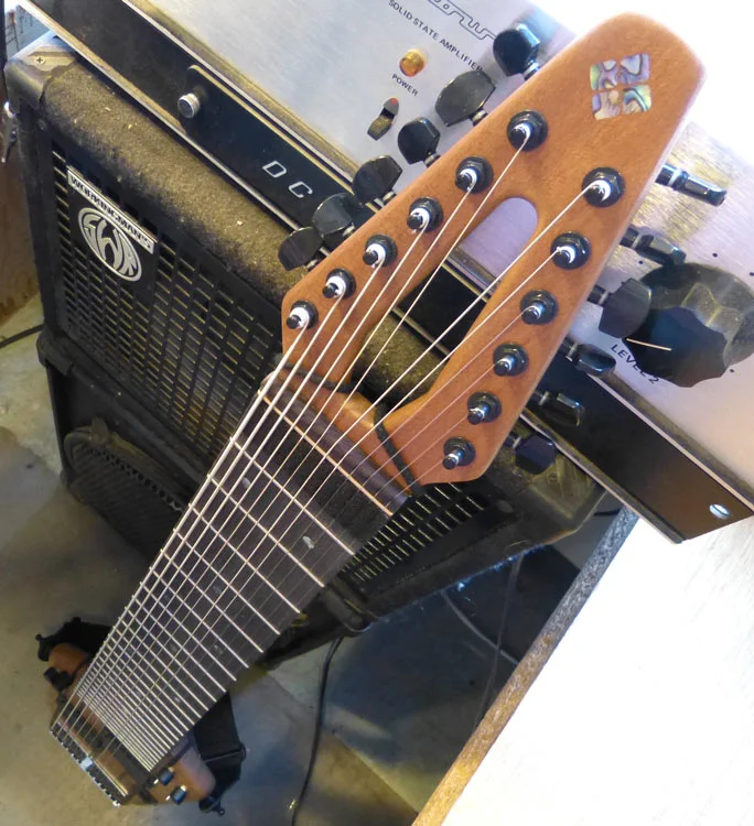 How do you amplify your fretboard tapping instrument?