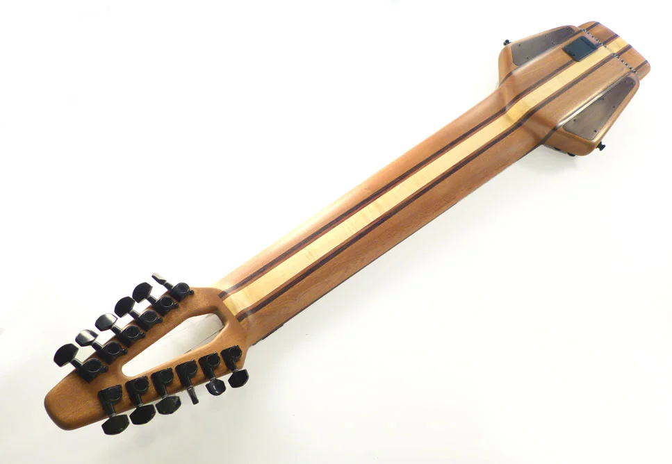 Sapele with wenge/bubinga stripes and curly maple core.