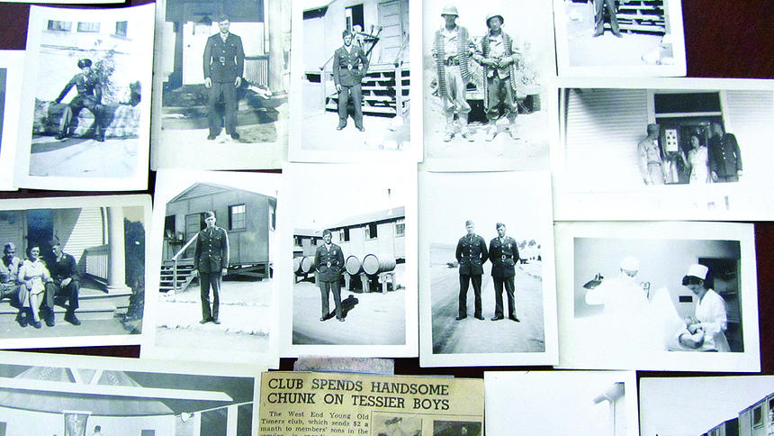 Lorraine DeRoche recently displayed photos of her six brothers in various phases of World War II. The Tessiers all survived the war and reunited with their parents at their West End home. With the death of Henry in October, Lorraine is the only sibling left out of 12. Mike Creger / mcreger@duluthnews.com