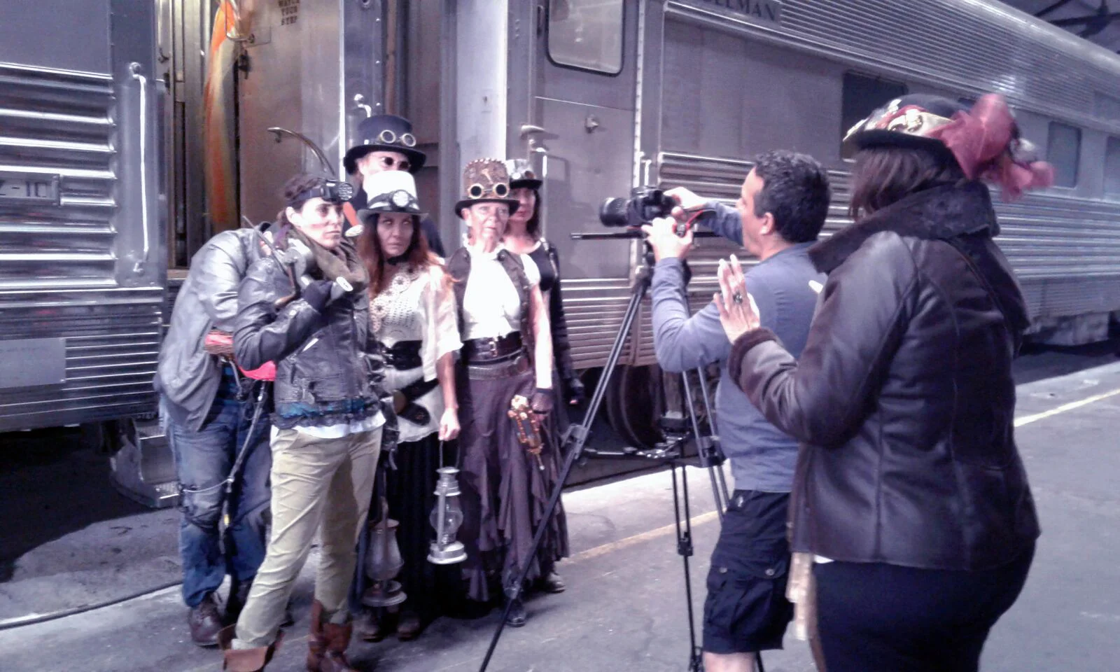 Director of Photography Lester Llanes preparing a scene with the cast.