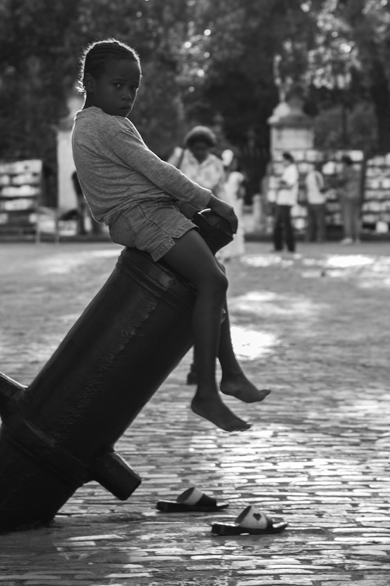 girl on top of the cannon. Old Havana, Cuba 2010