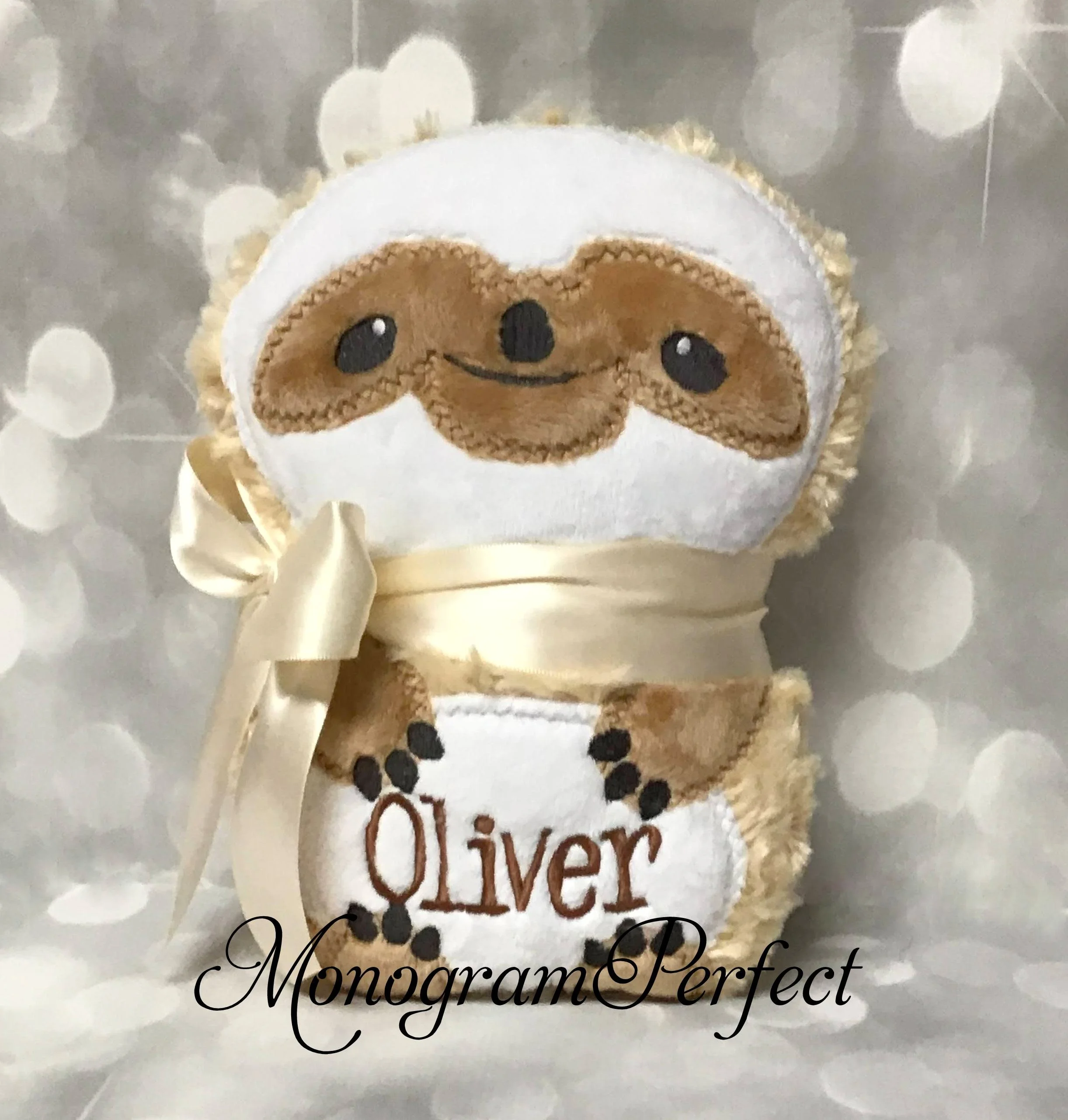 oliver sloth with ribbon.JPG