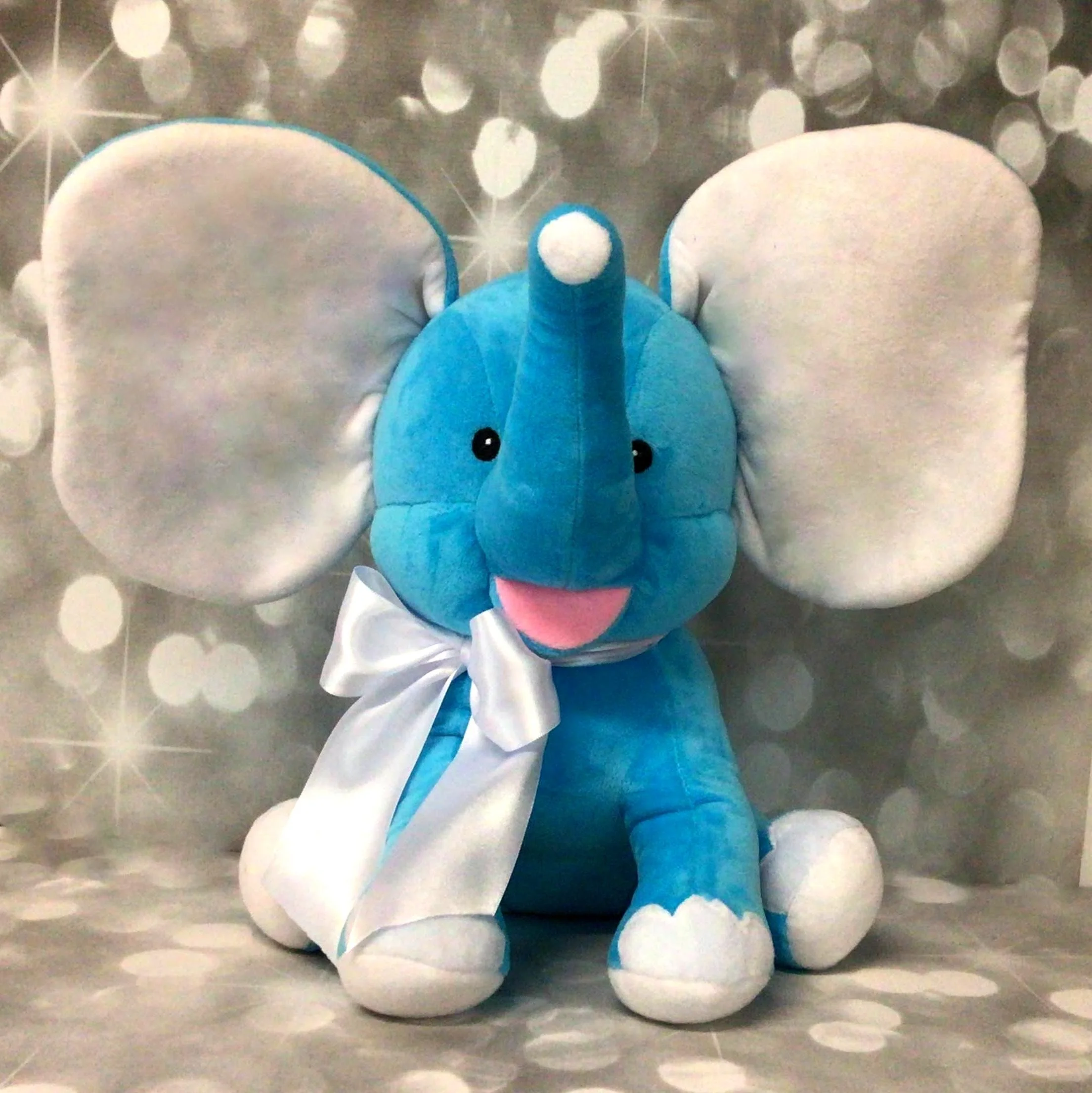 teal blue elephant with no logo.JPG
