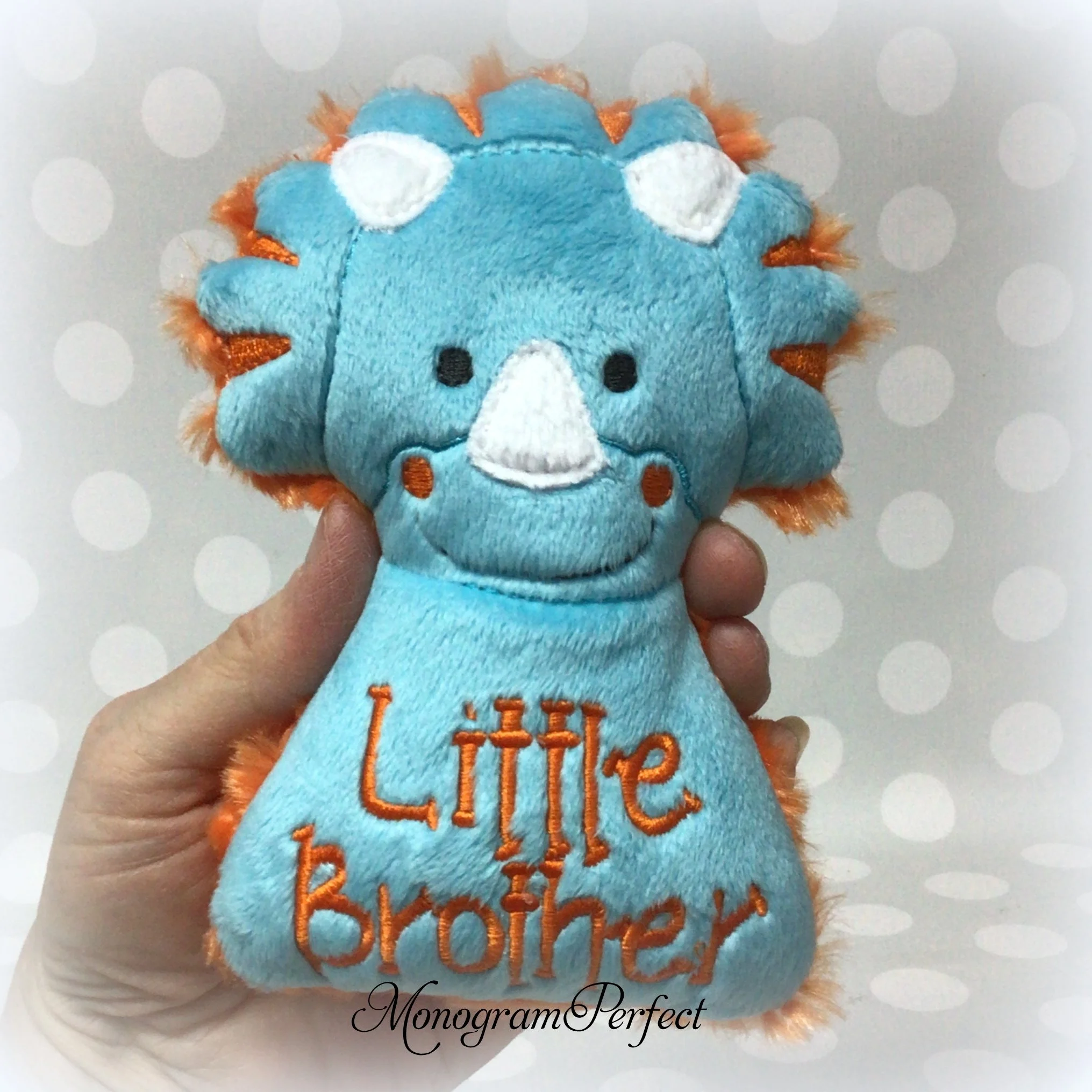 little brother dino rattle.jpg