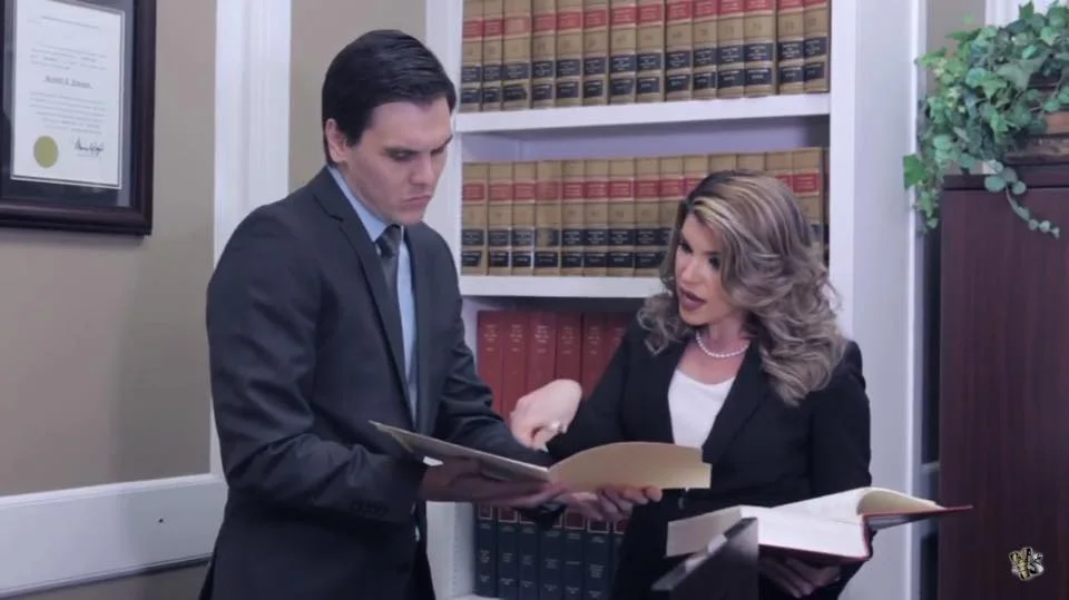 Paralegal Senior, George Benitez and Attorney Lisette Cardo
